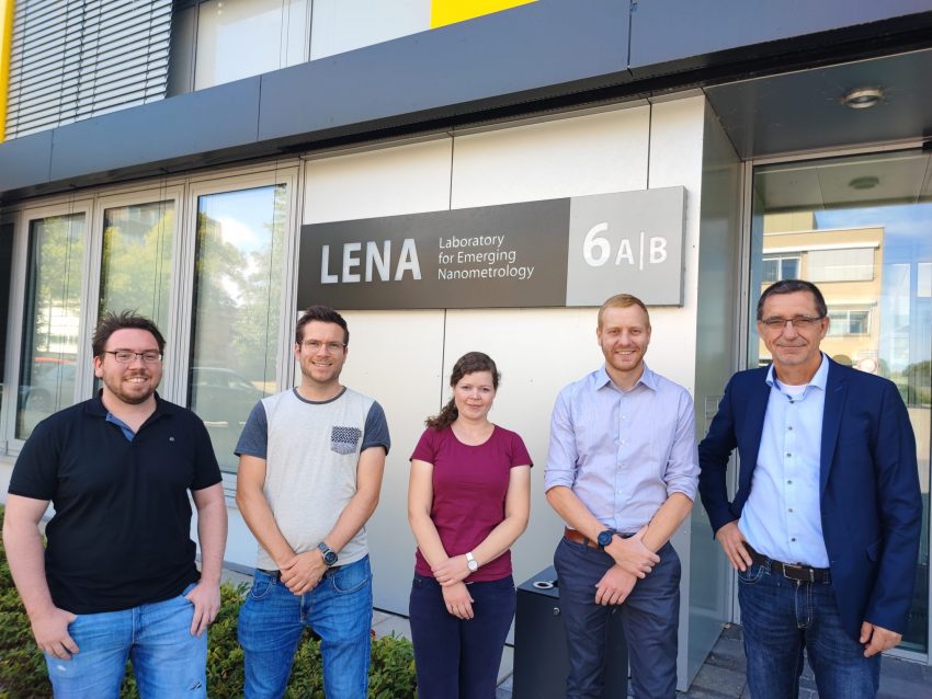 Scientists of the MicroPhotonicsLab in front of the LENA research centre.