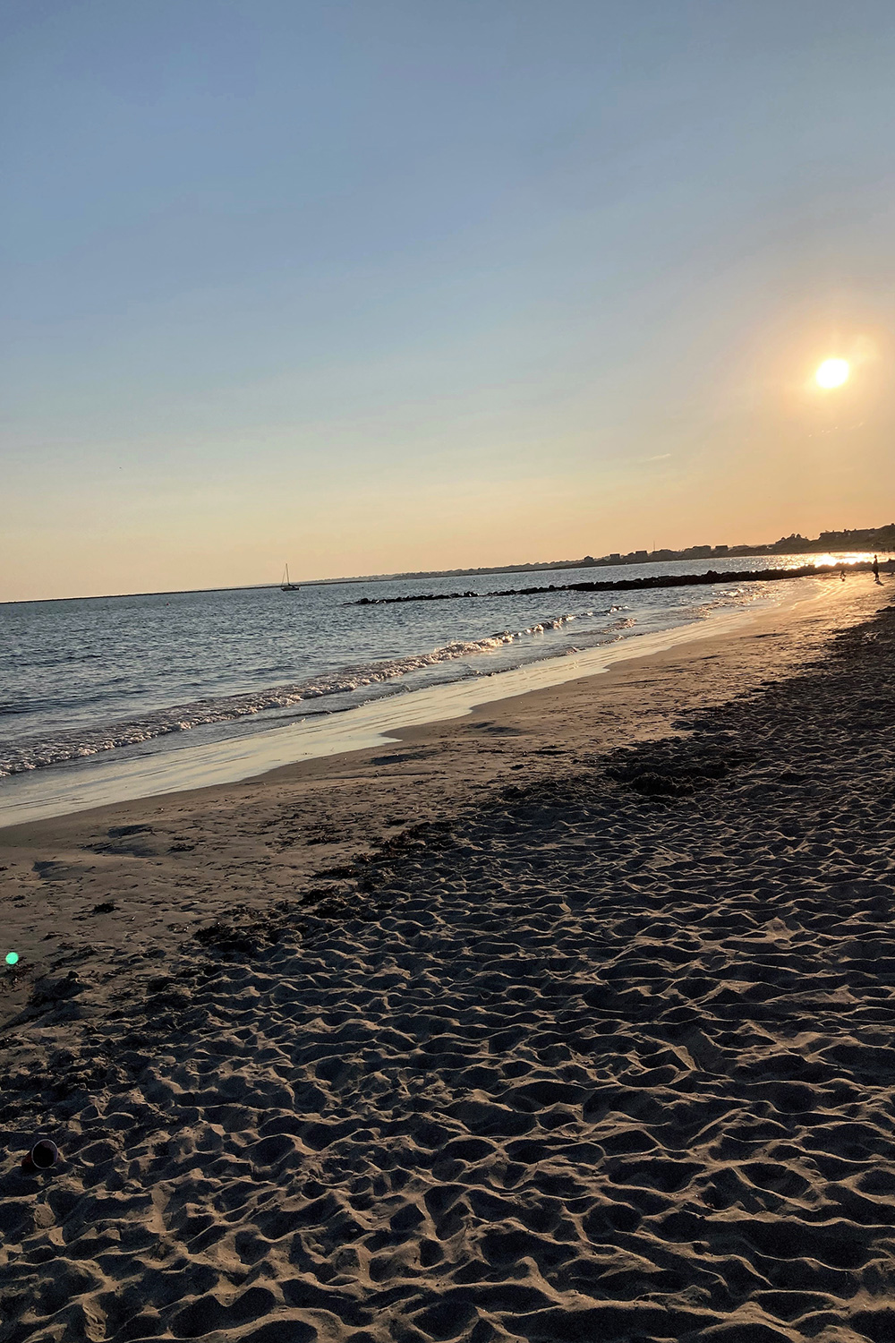 The sun is shining on Roger Wheeler State Beach.